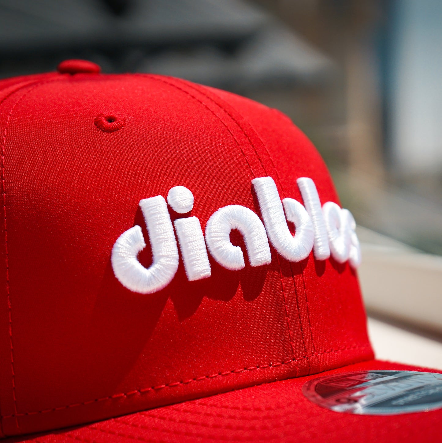 DIABLOS WORDMARK 970 FEATHER POLY HAT- NEWERA